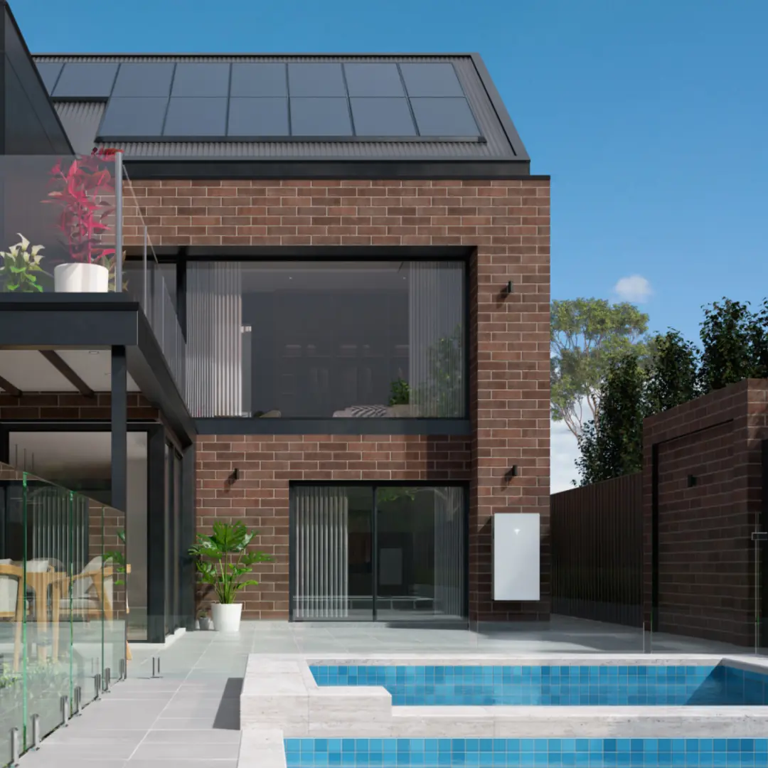 House with solar panels and a Powerwall on the wall