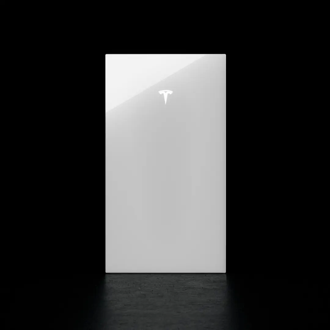 Tesla Powerwall 3 lit against a black background